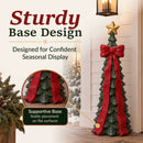 Infographic featuring a green Christmas tree sculpture with a red bow and gold star, highlighting its supportive base and stable placement on flat surfaces.