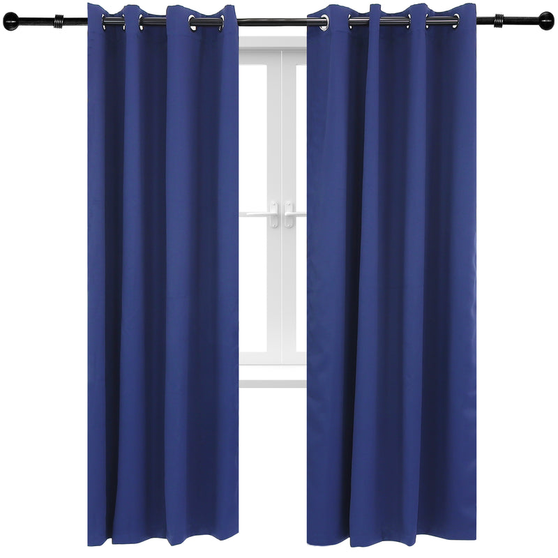 Two blue indoor/outdoor curtain panels hug from a black curtain rod in front of a white window.