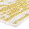 corner of abstract pattern outdoor rug golden fire