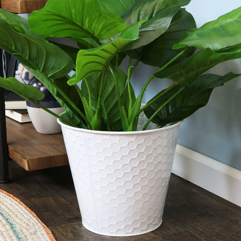 white steel bucket with hexagon pattern