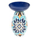 Mosaic Medallion Glass Bird Bath in blue featuring a deep blue glass bowl and decorative pedestal with an intricate blue, white, and orange medallion pattern.