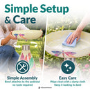 Mosaic Bloom Glass Bird Bath in rainbow shown being assembled and cleaned outdoors. The bowl attaches to the pedestal without tools, and the glass surface can be wiped clean with a damp cloth.