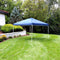 Blue 12'x12' pop up canopy with white frame set up on a backyard lawn.