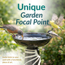 Decorative black-and-cream glass birdbath surrounded by greenery, with three birds drinking and perched around the bowl. Text highlights the birdbath as a unique garden focal point.