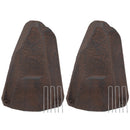 Two dark brown faux rock utility covers with tall, tapered shapes and realistic textured stone surfaces, each displayed with three metal ground stakes, arranged side by side against a white background.