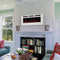 White 50-in sophisticated hearth indoor electric fireplace mounted on a wall above a bookcase in a living room