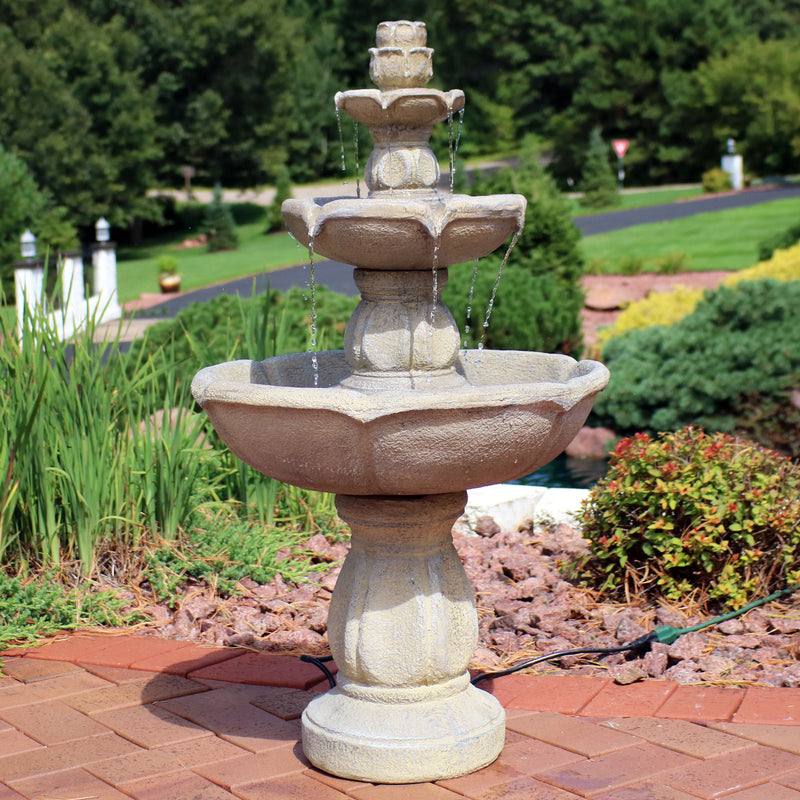 3 tier outdoor water fountain displayed as a centerpiece in the backyard.
