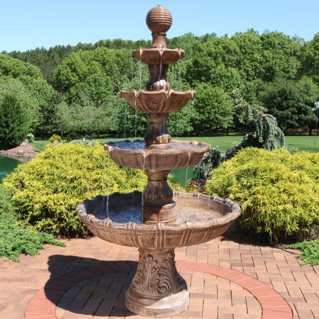 Extra large 4 tier water fountain as a centerpiece in the backyard.