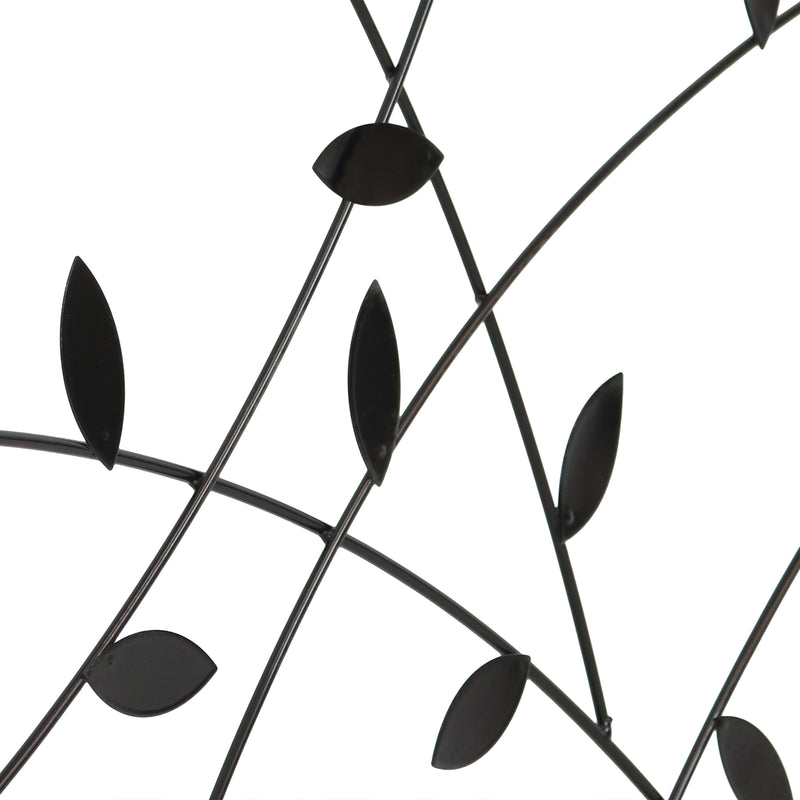 Single modern-style fence panel with decorative metal leaves placed in grass