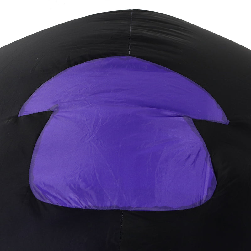 Back view of the black inflatable spider with purple and yellow legs.