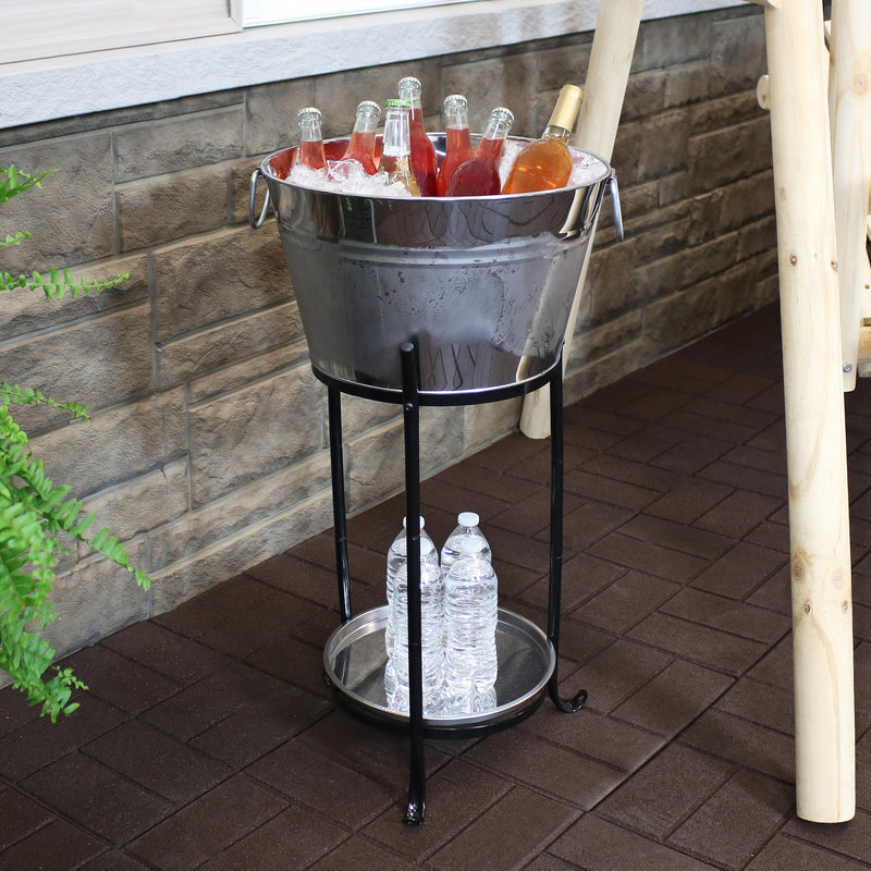 Ice bucket drink cooler holding many different beverages on the patio.
