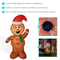 Brown gingerbread inflatable face and upright arm in a wave position. 