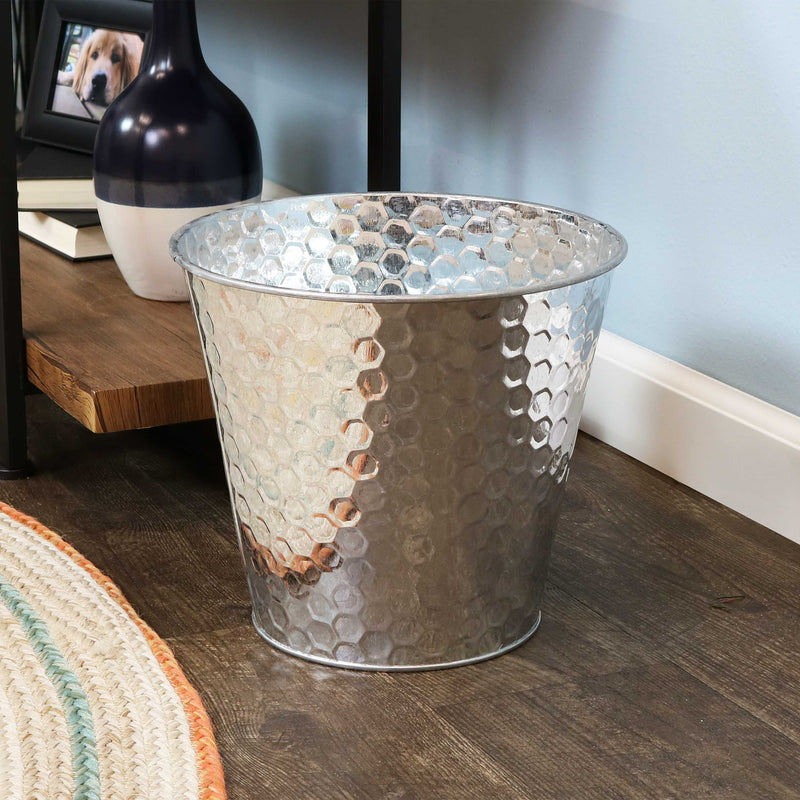 bottom of silver steel bucket with hexagon pattern