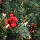 pre-lit artificial christmas tree with berries and pinecones