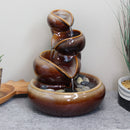brown tiered indoor ceramic tabletop water fountain