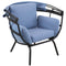 Profile view of blue luxury egg chair with the retraceable shade put down.