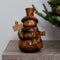 Wooden snowman indoor Christmas decor figurine holding a joy" sign sitting on marble table