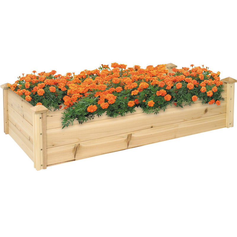 Rectangular, raised wood garden bed with orange flowers.