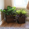 bottom of brown square polyrattan indoor planter