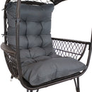 Black wicker armrest of comfort egg chair.