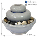 gray ceramic indoor tabletop water fountain with rocks