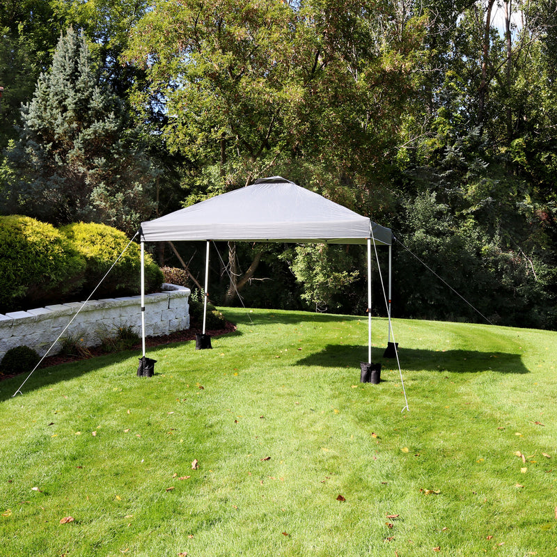 gray 10'x10' pop up canopy with white frame and sandbags