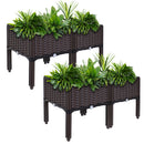 Set of two self-watering raised planters with green plants.