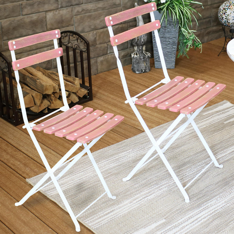 set of 2 pink and white wooden folding chairs