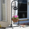 Welcome hanging basket plant stand placed on the front step.
