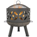 Outdoor retro cast iron fire pit with handles and spark screen shown with fire burning