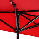 Close up of LED lights and ribs of a red solar umbrella. 