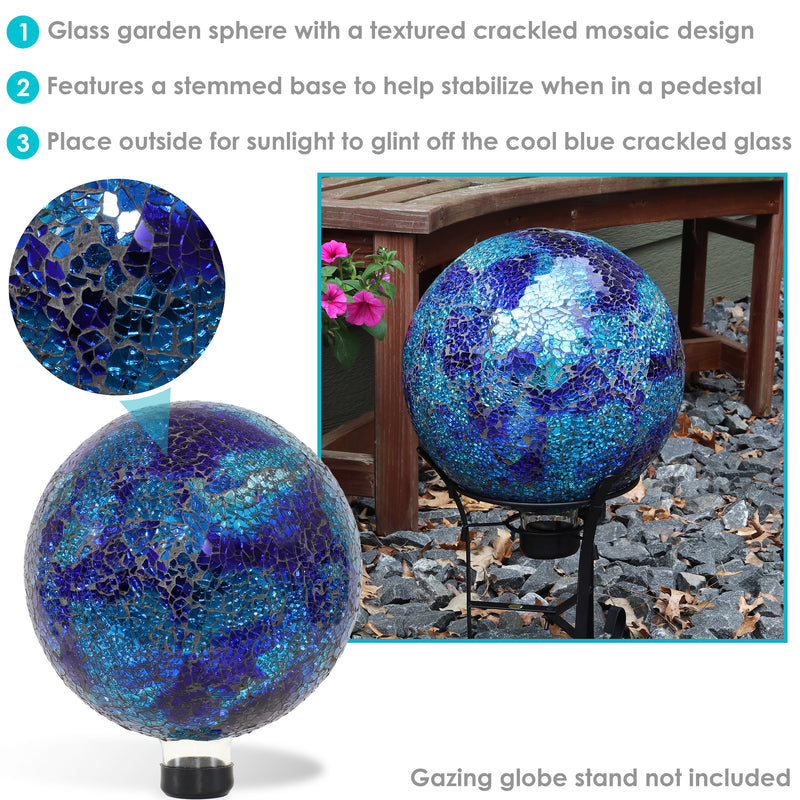 Deep ocean blue gazing globe with mosaic crackled glass pattern sitting in a black metal gazing globe stand.