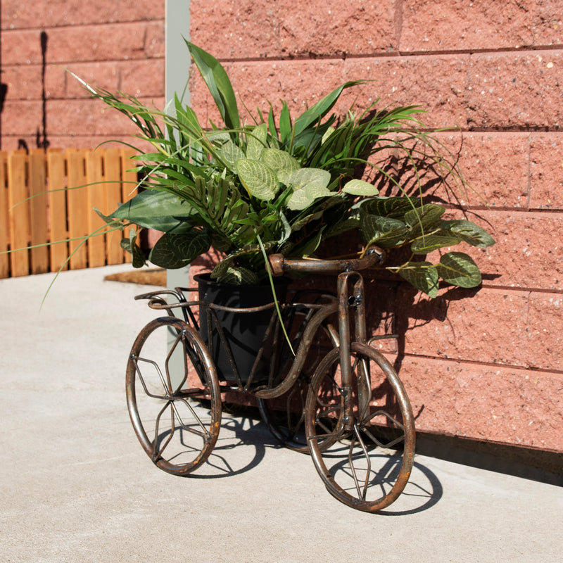 front of metal tricycle standing planter basket