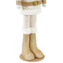 Front facing view of off-white and gold plush nutcracker statue.