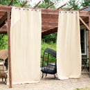 Beige fabric corner of indoor/outdoor room darken curtain.