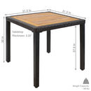 Corner edge of outdoor patio table with resin rattan wick edge and acacia wood tabletop