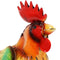 Back view of colorful metal rooster statue. 