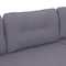 Outdoor patio sectional sofa set with charcoal colored cushions and accent throw pillow