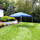 Blue 12'x12' pop up canopy with white frame set up on a backyard lawn.